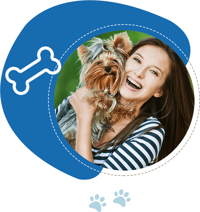 Woman smiling and holding a Yorkshire Terrier. The image is framed by a blue shape with a white bone icon and paw prints below.